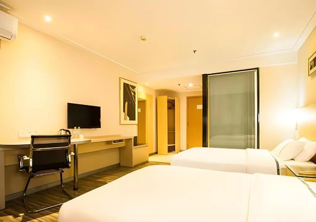 Bed in City Comfort Inn Guiping Xishan