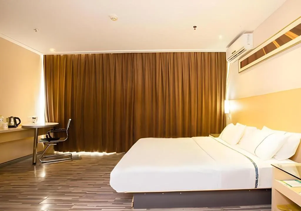 Bed in City Comfort Inn Guiping Xishan