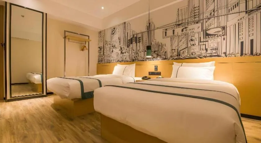 Bed in City Comfort Inn Guiping Xishan