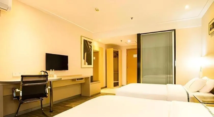 Bed in City Comfort Inn Guiping Xishan