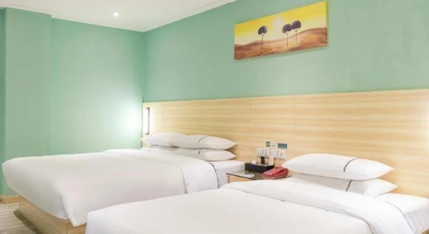 Bed in City Comfort Inn Guiping Xishan