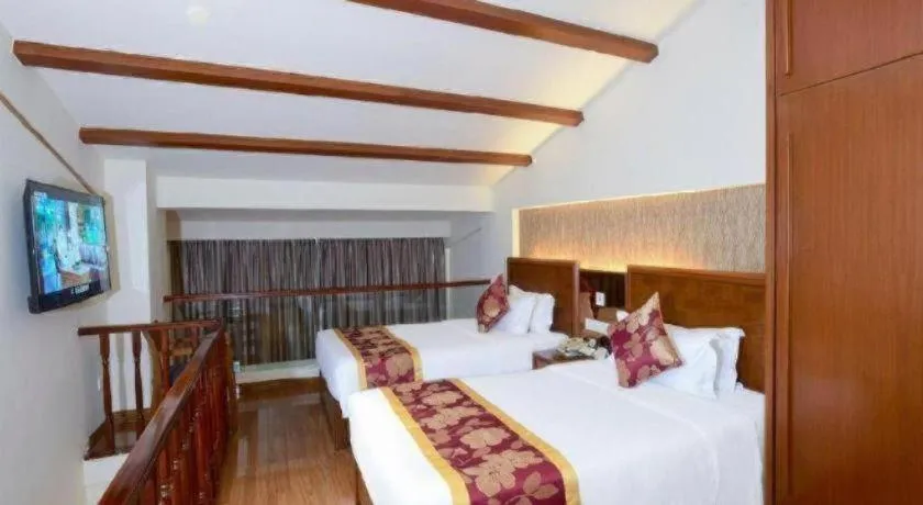 Bed in Yi Yuan Xuan Yu Hotel