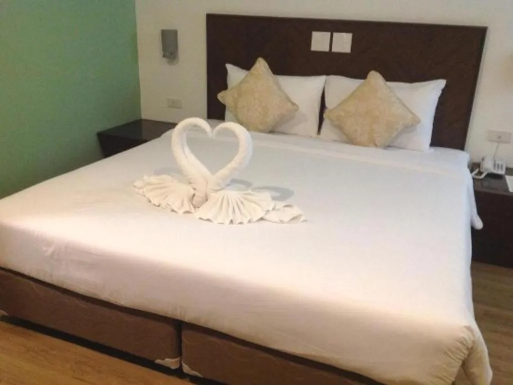 Bed in The Flora May Resort