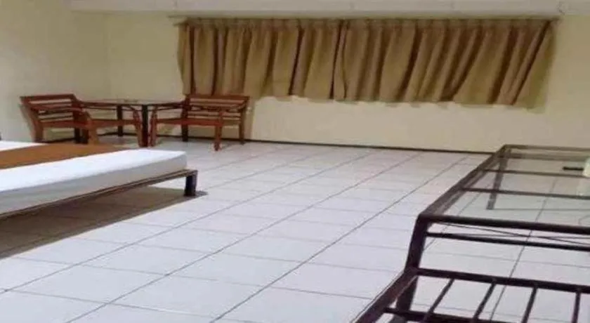 Bed in Hotel Augusta Jakarta