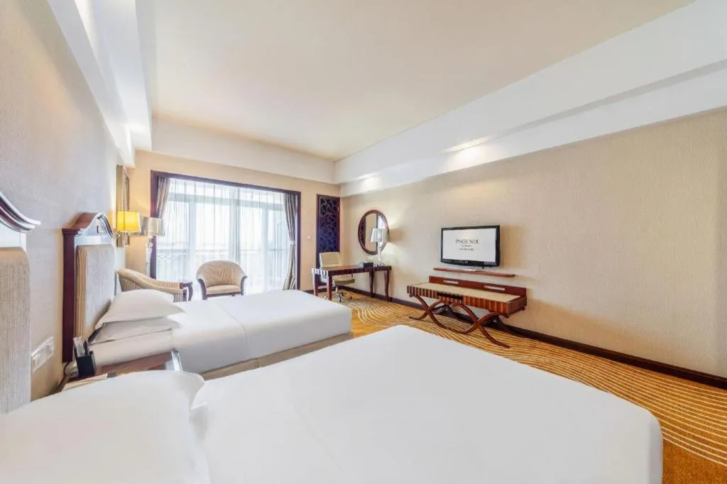 Bed in Country Garden Phoenix Hotel Chizhou Jiuhua Mountain