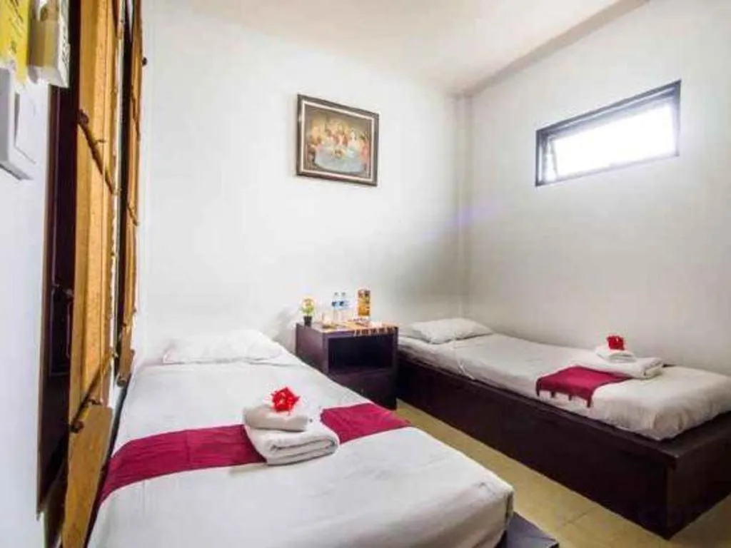 Bed in Al-Isha Dharamshala