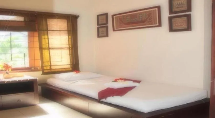 Bed in Al-Isha Dharamshala