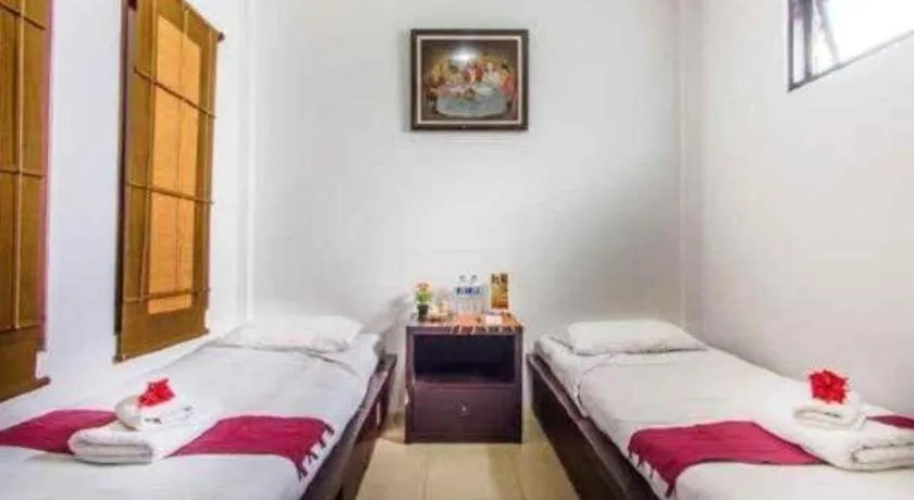 Bed in Al-Isha Dharamshala