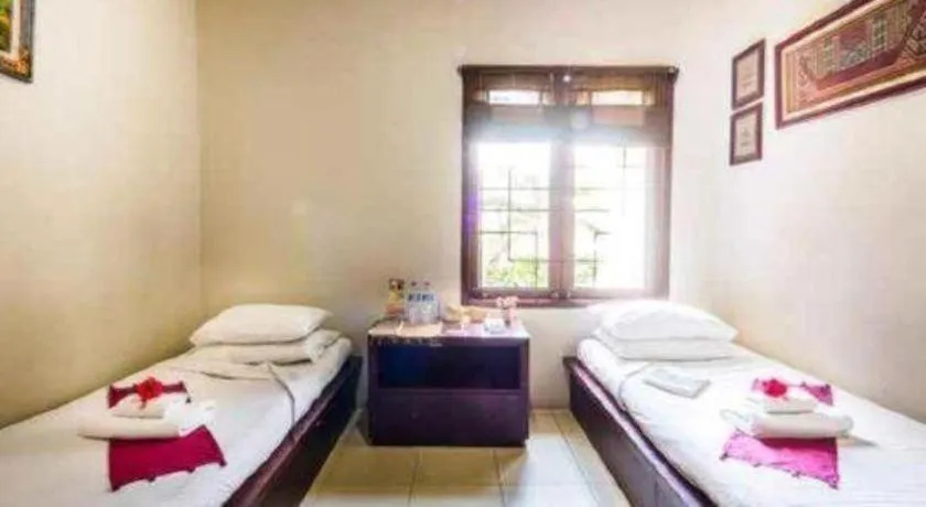 Bed in Al-Isha Dharamshala