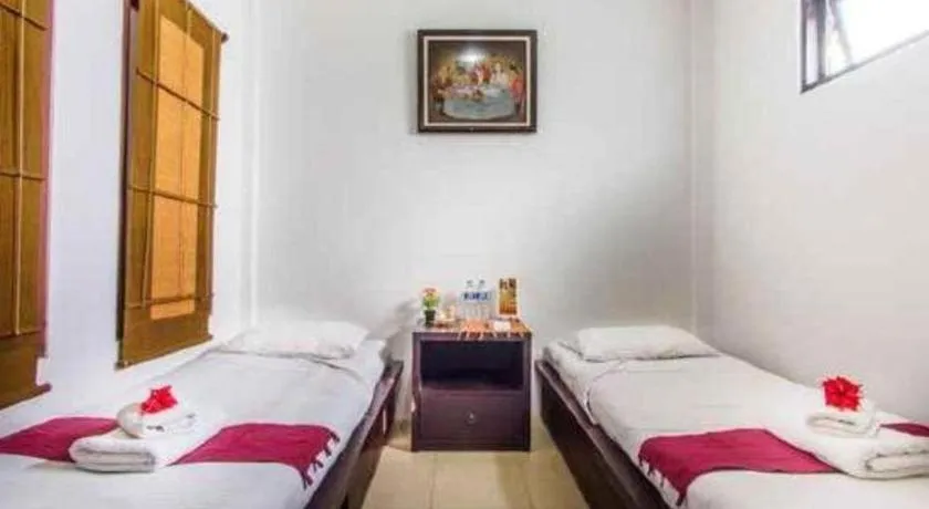 Bed in Al-Isha Dharamshala