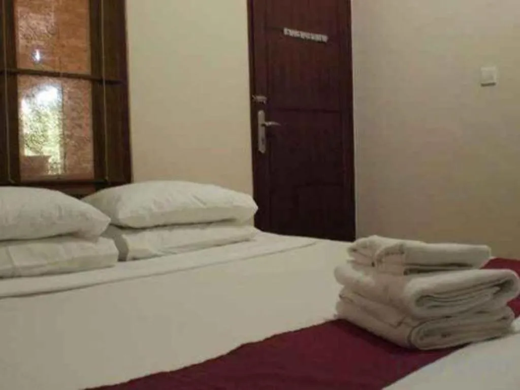 Bed in Al-Isha Dharamshala