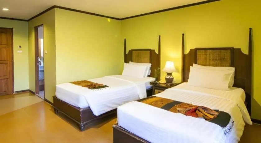 Bed in Phuphaya Resort Pattaya