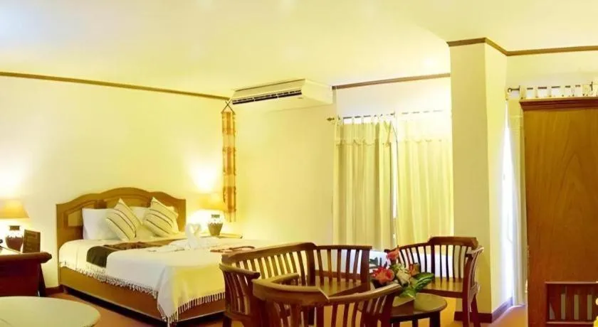 Bed in Phuphaya Resort Pattaya