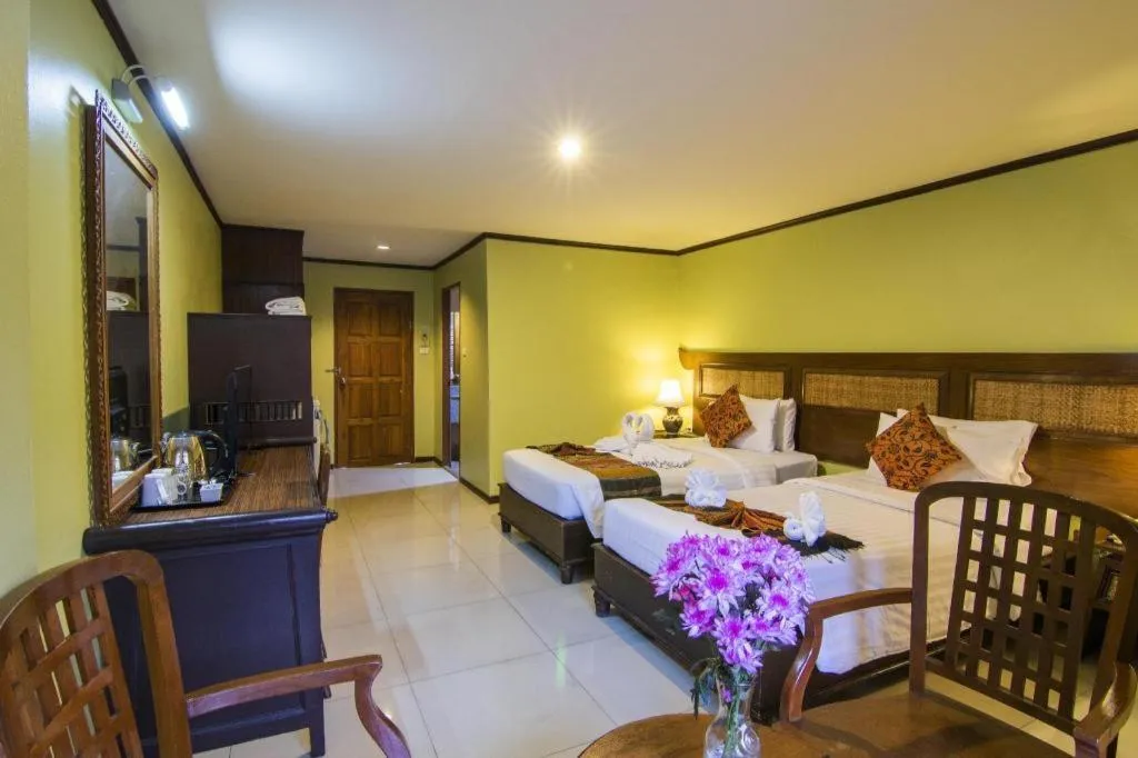 Bed in Phuphaya Resort Pattaya