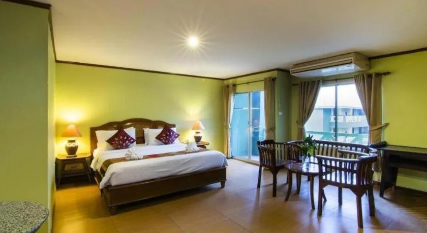 Bed in Phuphaya Resort Pattaya