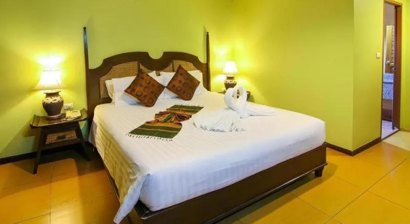Bed in Phuphaya Resort Pattaya