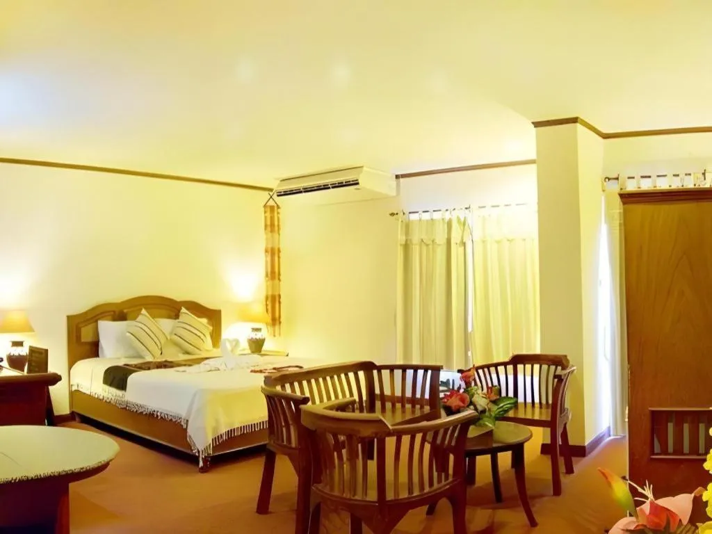 Bed in Phuphaya Resort Pattaya