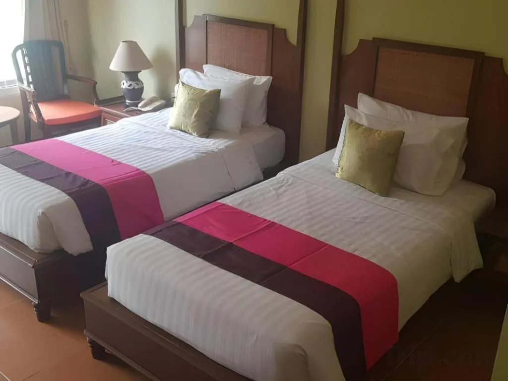 Bed in Phuphaya Resort Pattaya