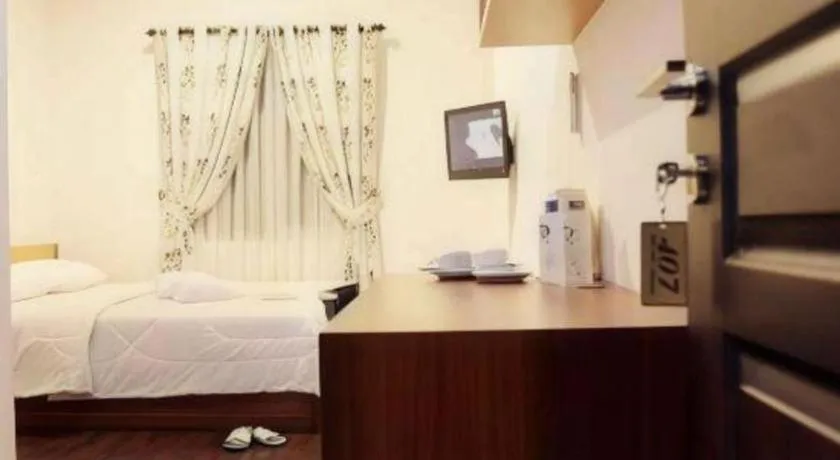 Bed in Lotus Bandung Hotel, Cafe, and Meeting Place