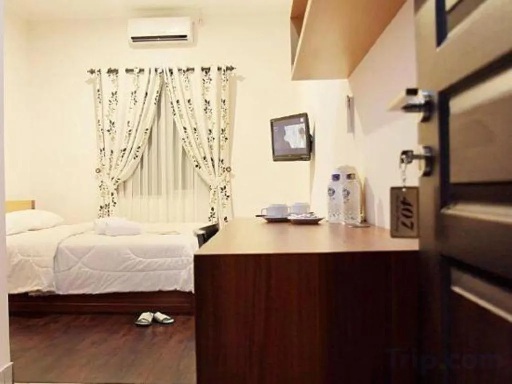 Bed in Lotus Bandung Hotel, Cafe, and Meeting Place