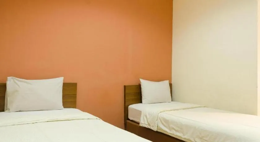 Bed in Lotus Bandung Hotel, Cafe, and Meeting Place