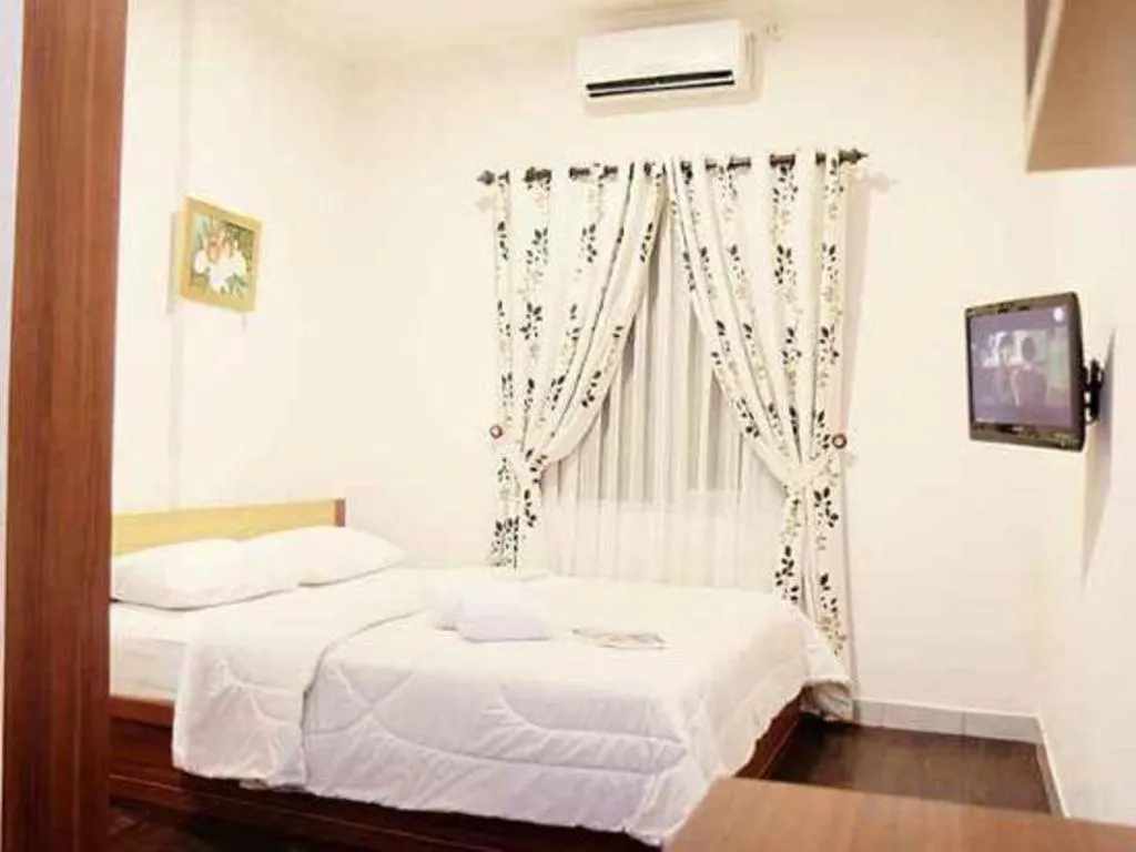 Bed in Lotus Bandung Hotel, Cafe, and Meeting Place