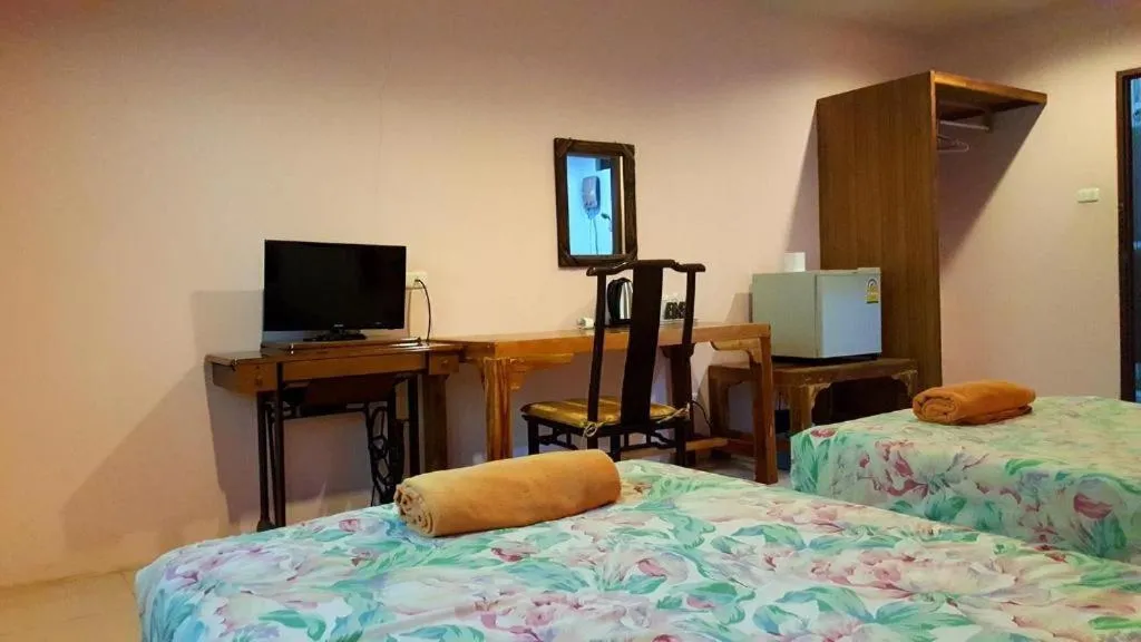 Bed in Baan Suan Sook Resort