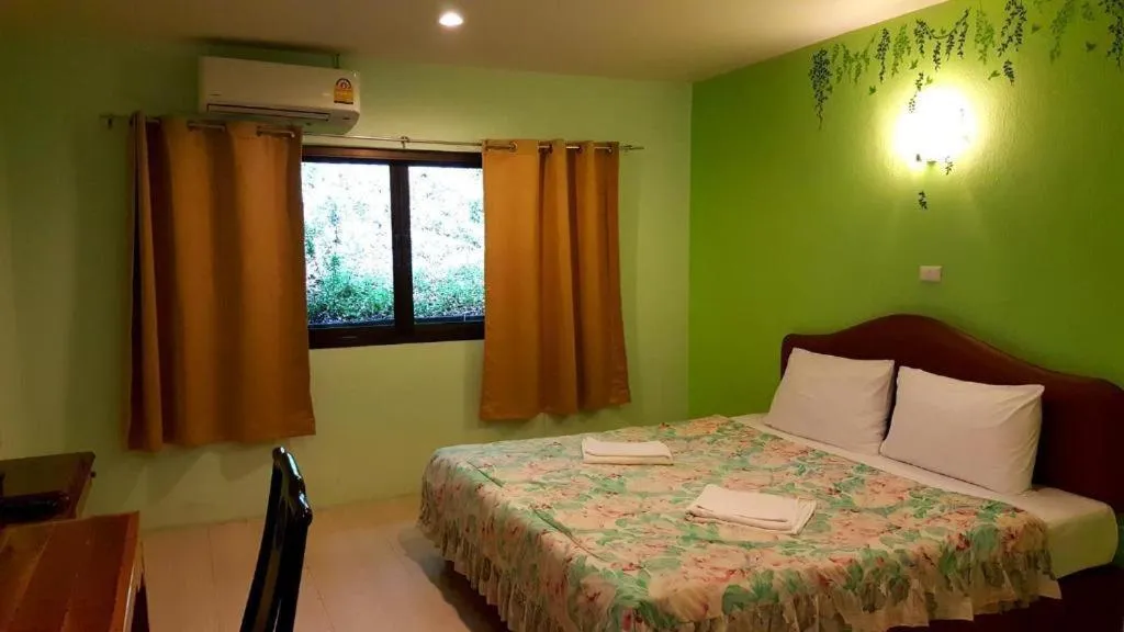 Bed in Baan Suan Sook Resort