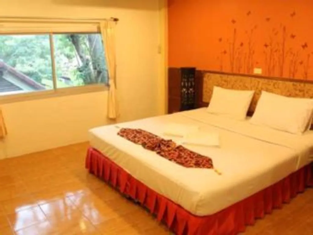 Bed in Baan Suan Sook Resort