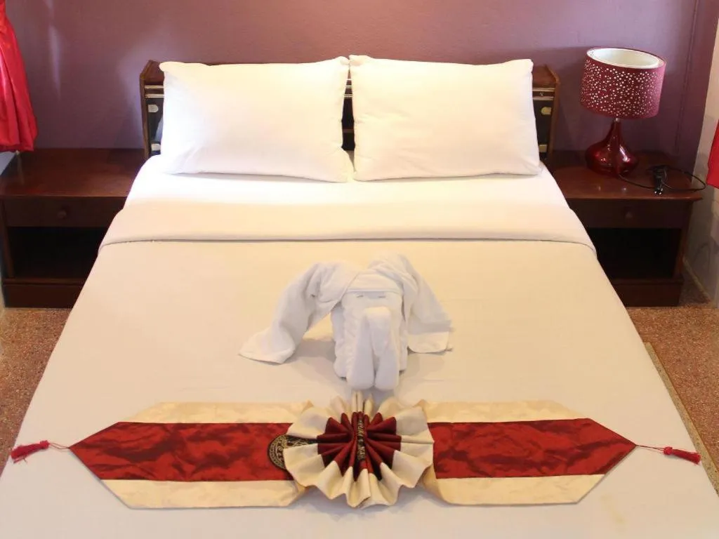 Bed in Baan Suan Sook Resort