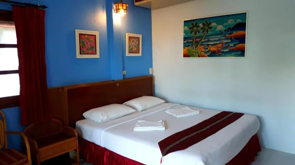 Bed in Baan Suan Sook Resort