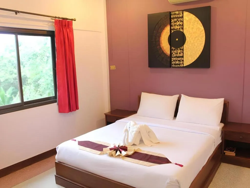 Bed in Baan Suan Sook Resort