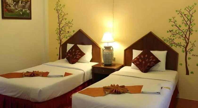 Bed in Baan Suan Sook Resort