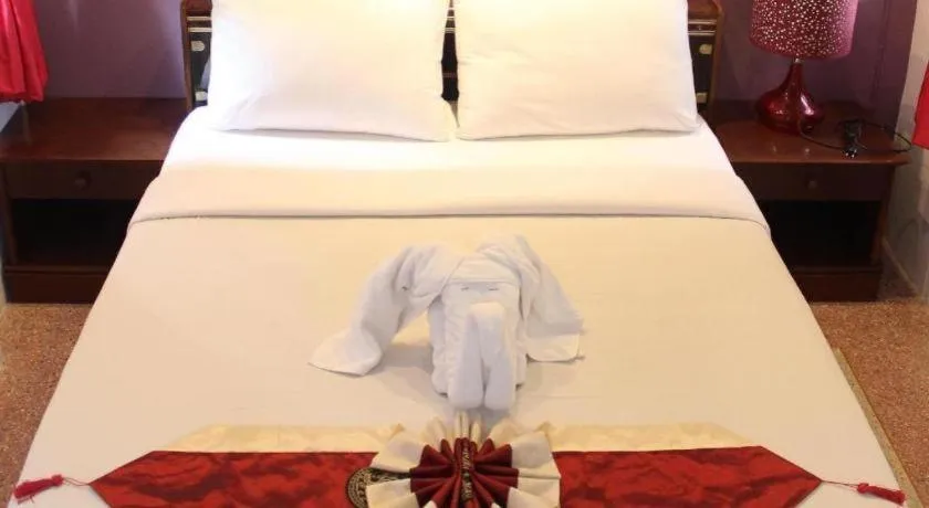 Bed in Baan Suan Sook Resort