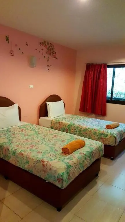 Bed in Baan Suan Sook Resort