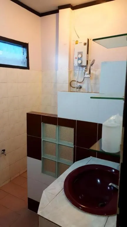 Bed in Baan Suan Sook Resort