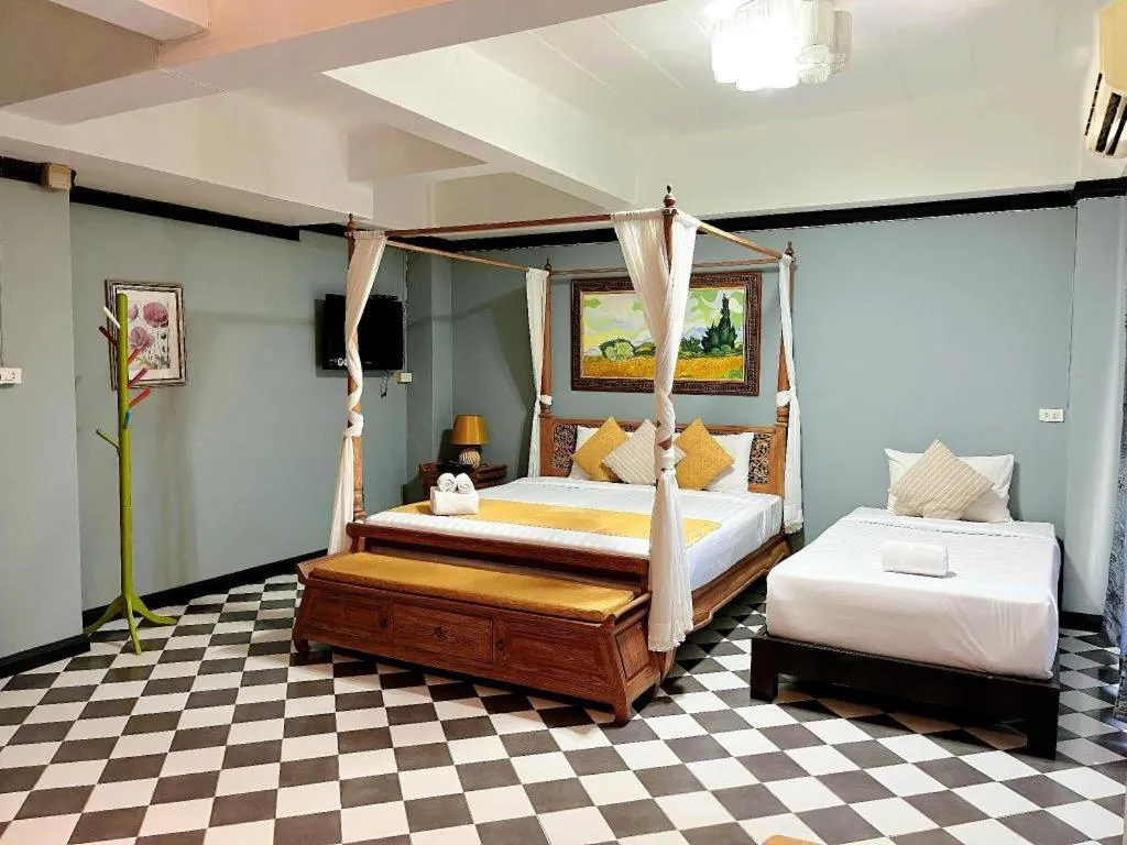 Bed in Ladawan Boutique Hotel