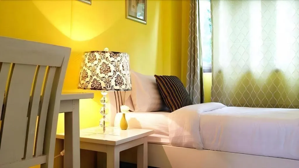 Bed in Ladawan Boutique Hotel