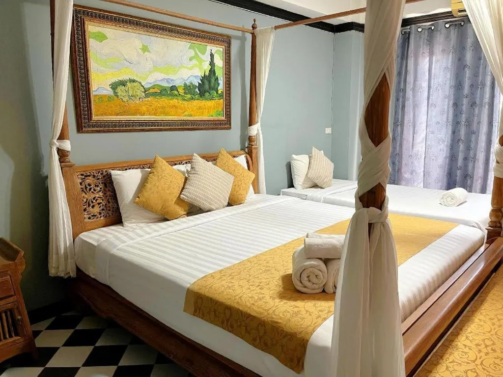 Bed in Ladawan Boutique Hotel