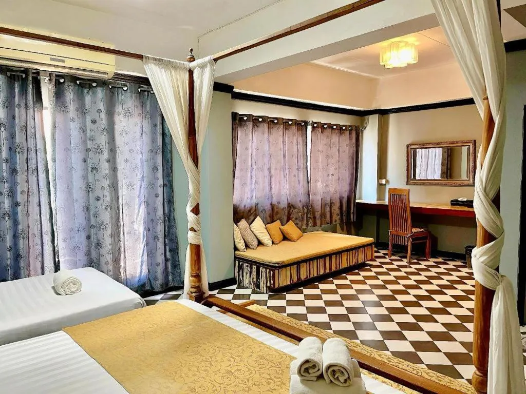 Bed in Ladawan Boutique Hotel