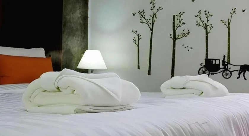 Bed in Ladawan Boutique Hotel