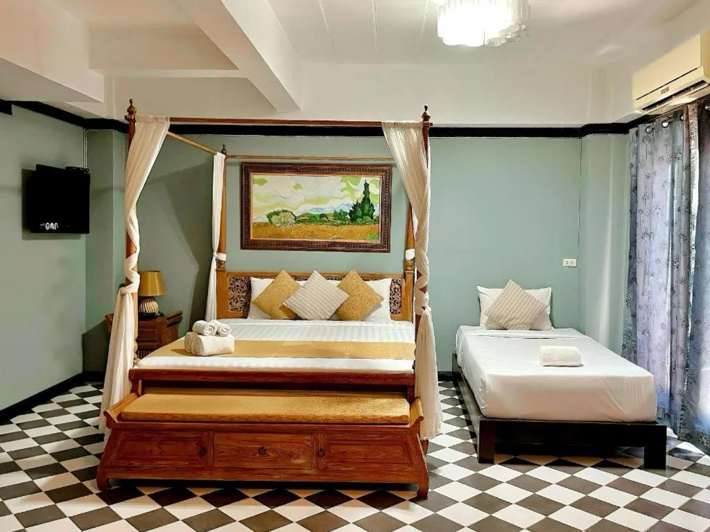 Bed in Ladawan Boutique Hotel