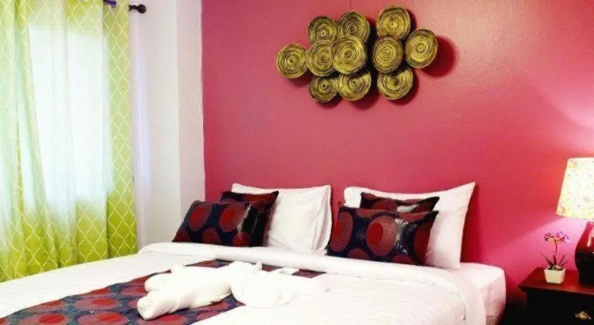 Bed in Ladawan Boutique Hotel