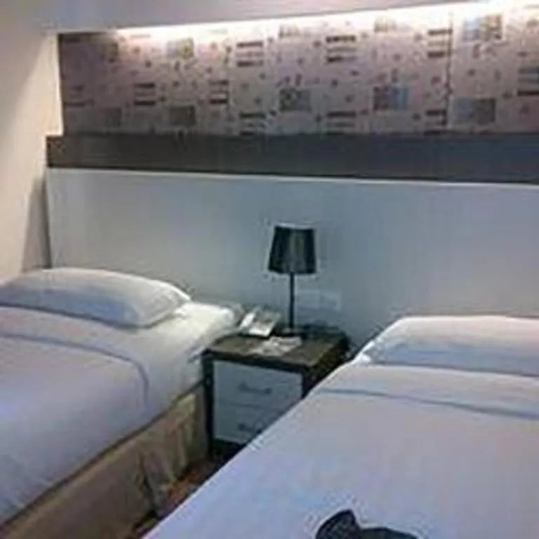 Bed in Hotel Benua