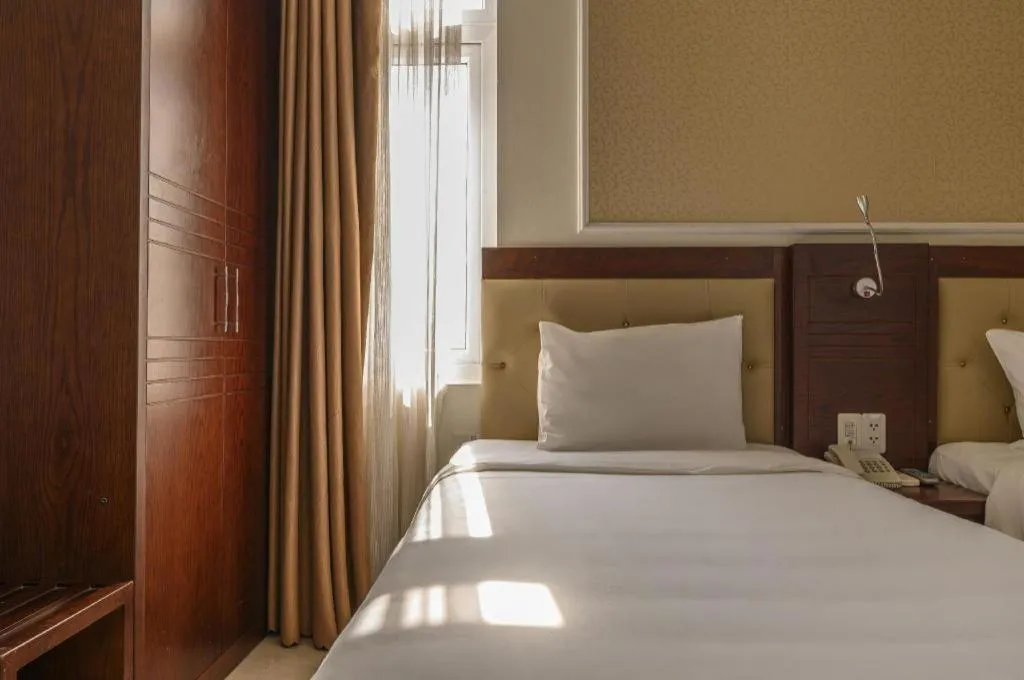 Bed in Ocean View Danang Hotel