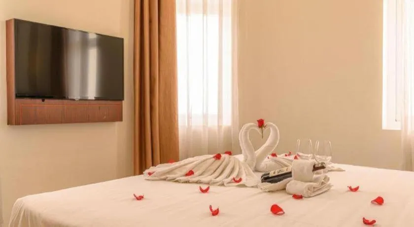 Bed in Ocean View Danang Hotel