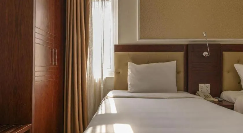 Bed in Ocean View Danang Hotel