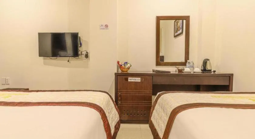 Bed in Ocean View Danang Hotel