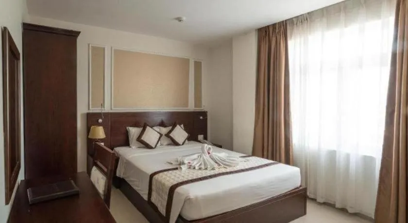 Bed in Ocean View Danang Hotel