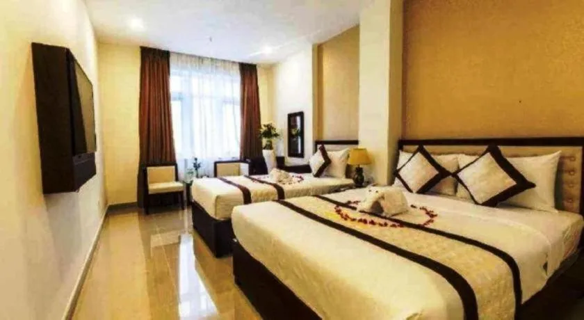 Bed in Ocean View Danang Hotel